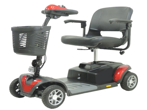 A gray and red mobility scooter with a front basket, wide seat, and four wheels on a flat surface named for home use